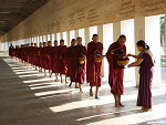 Offering rice to the monks, Mandalay, Myanmar (Burma) Photo