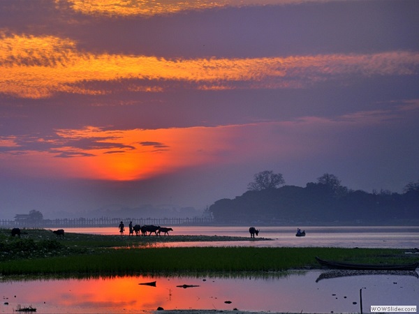 Sunrise at U Bein bridge, Mandalay region, Myanmar photo