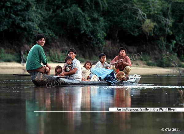 Indigenous family in the Waini River, Guyana photo